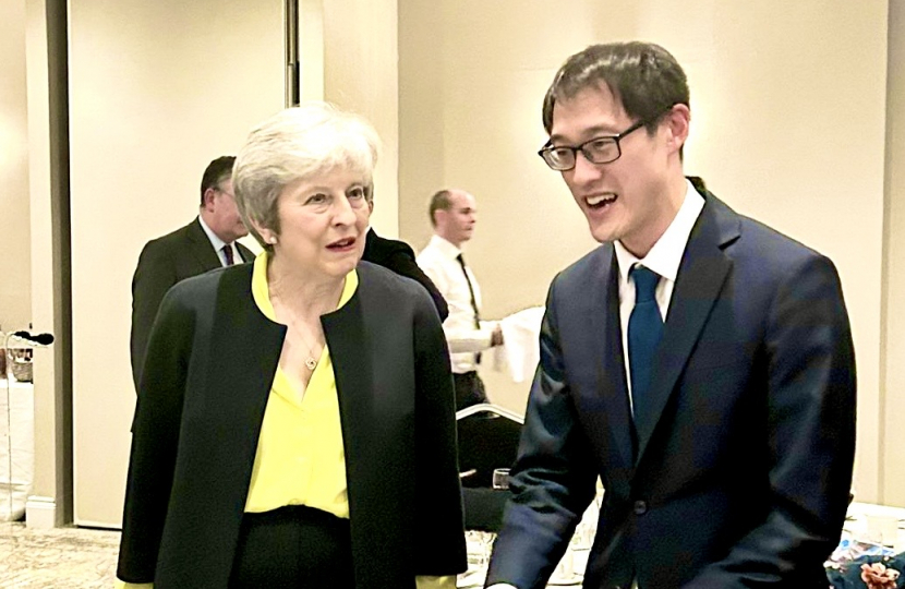 Theresa May with Johnny Luk